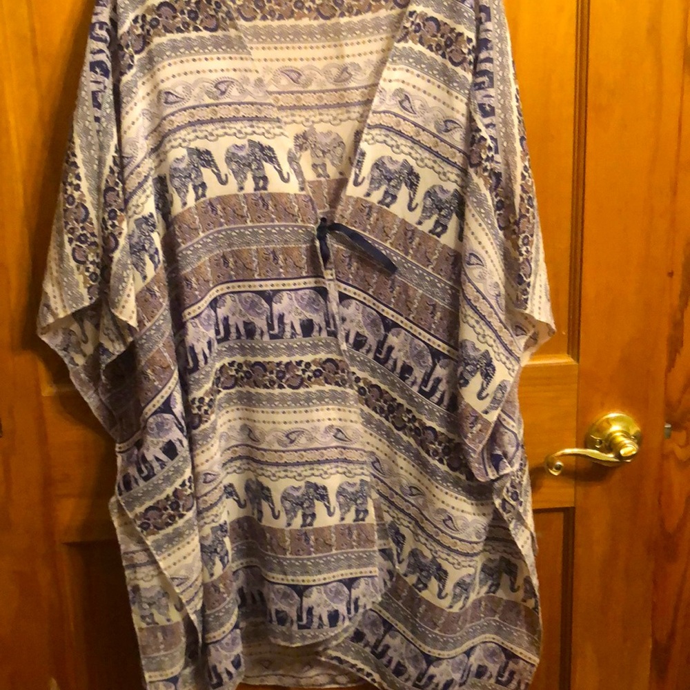 Lightweight and flowy tunic top/ vest. Open in front with tie